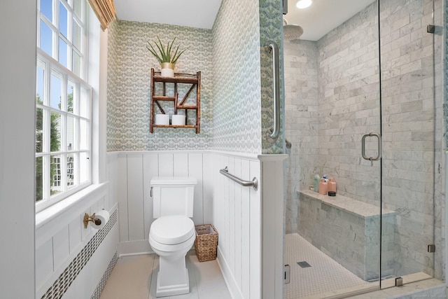 455 E St, Middletown, CT 06457 - bathroom with healthy amount of natural light, a shower stall, toilet, wallpapered walls, and a wainscoted wall