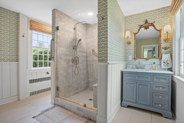 455 E St, Middletown, CT 06457 - bathroom featuring radiator heating unit, wallpapered walls, a wainscoted wall, a shower stall, and vanity