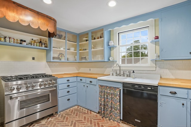 455 E St, Middletown, CT 06457 - kitchen featuring black dishwasher, open shelves, high end range, a sink, and butcher block countertops