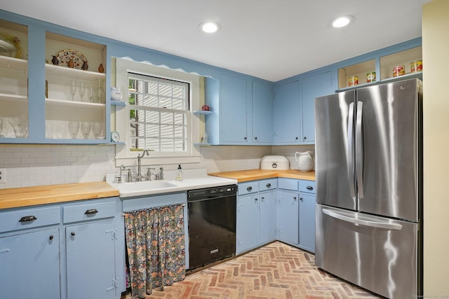 455 E St, Middletown, CT 06457 - kitchen featuring freestanding refrigerator, black dishwasher, open shelves, blue cabinetry, and recessed lighting