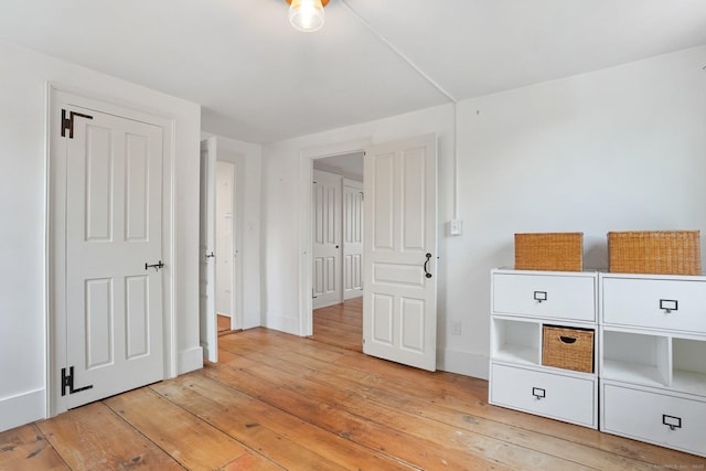 455 E St, Middletown, CT 06457 - unfurnished bedroom featuring light wood-style flooring and baseboards