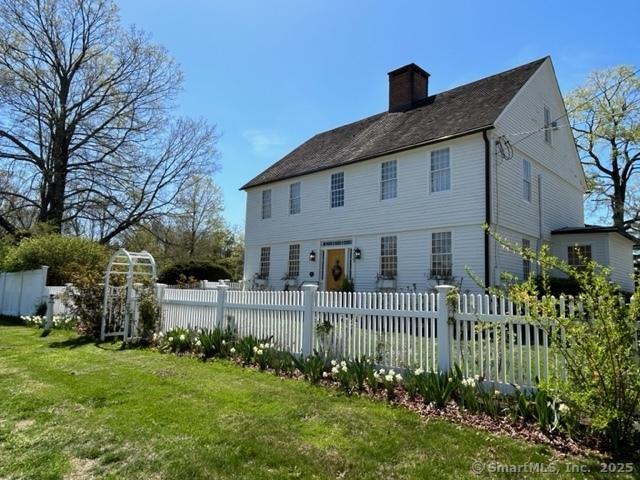 455 E St, Middletown, CT 06457 - back of house with a chimney