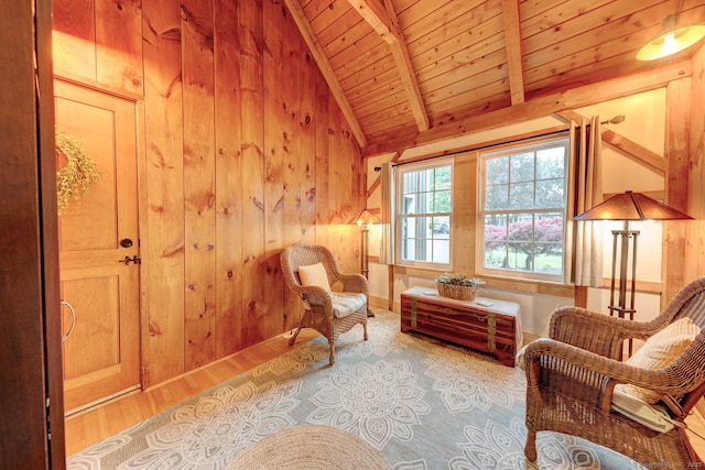 living area with wooden ceiling, wood walls, and wood finished floors