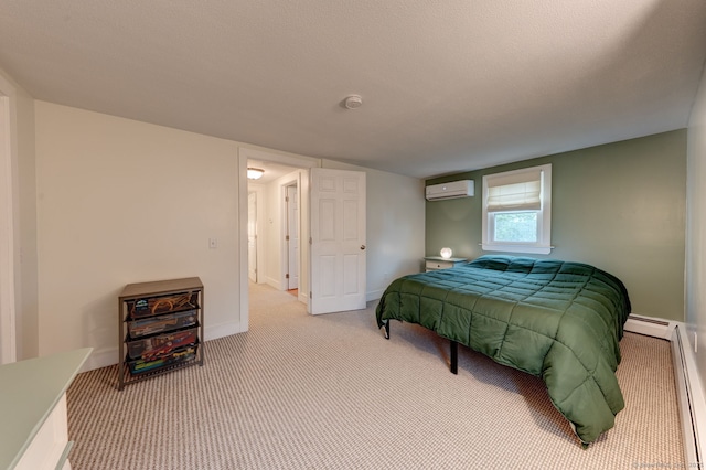 carpeted bedroom featuring an AC wall unit, baseboards, and a baseboard radiator