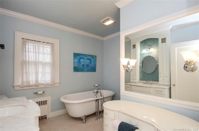262 Kenyon St, Hartford, CT 06105 - full bathroom featuring a soaking tub, two vanities, ornamental molding, radiator, and baseboards