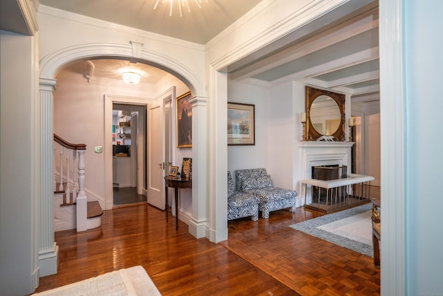 262 Kenyon St, Hartford, CT 06105 - hall featuring arched walkways, stairway, crown molding, parquet flooring, and baseboards