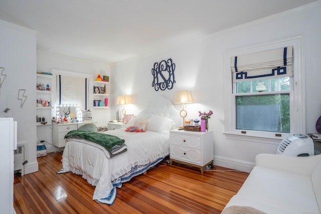 262 Kenyon St, Hartford, CT 06105 - bedroom with crown molding and wood finished floors