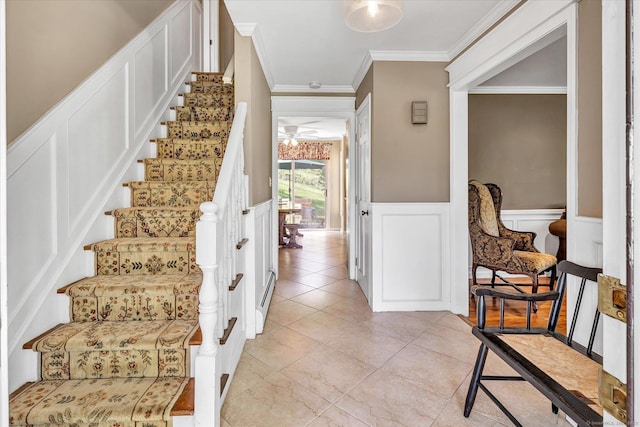 2 White Oak Farm Rd, Newtown, CT 06470 - stairway featuring crown molding, a decorative wall, wainscoting, tile patterned floors, and ceiling fan