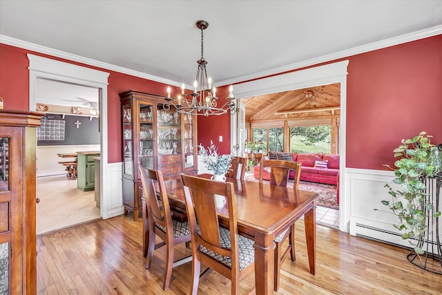 2 White Oak Farm Rd, Newtown, CT 06470 - dining space with a chandelier, hardwood / wood-style floors, wainscoting, and crown molding