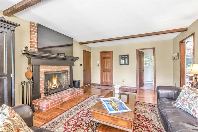 2 White Oak Farm Rd, Newtown, CT 06470 - living room with wood finished floors, beamed ceiling, a brick fireplace, and baseboards