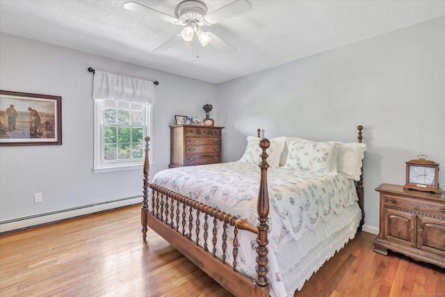 2 White Oak Farm Rd, Newtown, CT 06470 - bedroom with hardwood / wood-style flooring, a ceiling fan, and baseboard heating