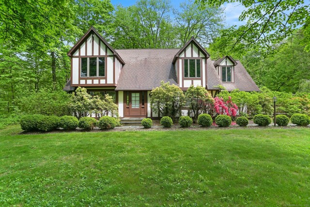 2 Kramer Ln, Weston, CT 06883 - english style home featuring a front lawn and a shingled roof