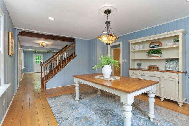 2 Kramer Ln, Weston, CT 06883 - dining room with light wood-type flooring, stairs, and ornamental molding