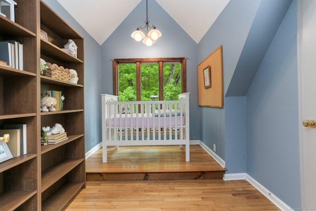 2 Kramer Ln, Weston, CT 06883 - bedroom with a chandelier, hardwood / wood-style floors, and vaulted ceiling