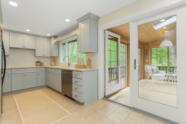 2 Kramer Ln, Weston, CT 06883 - kitchen with stainless steel dishwasher, gray cabinetry, backsplash, light countertops, and recessed lighting