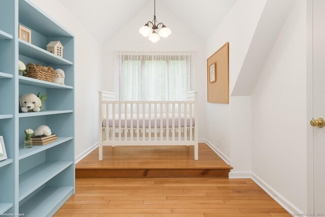 2 Kramer Ln, Weston, CT 06883 - corridor featuring light wood-style flooring, a chandelier, and lofted ceiling