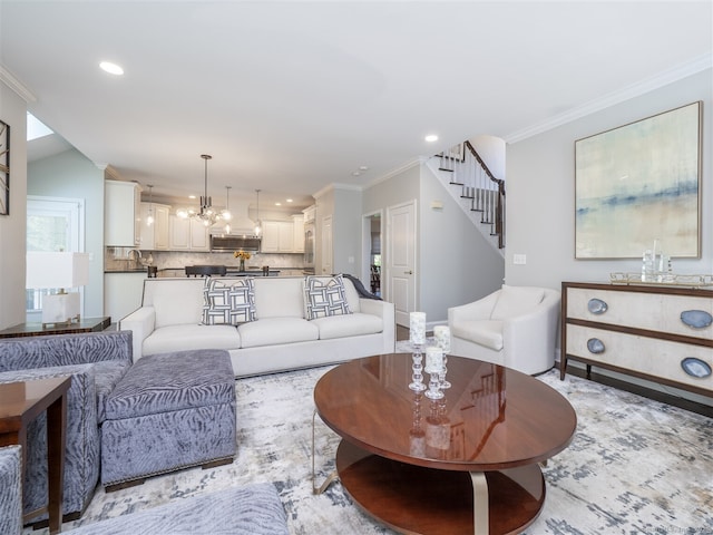 living area with stairway, recessed lighting, a chandelier, ornamental molding, and baseboards
