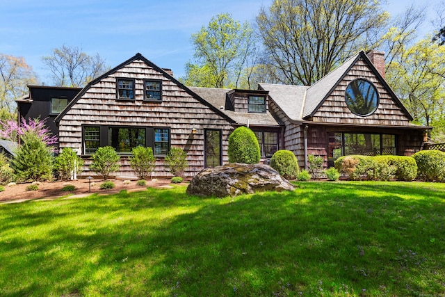 37 Cedar Hls, Weston, CT 06883 - view of front of house with a chimney, a front lawn, and roof with shingles
