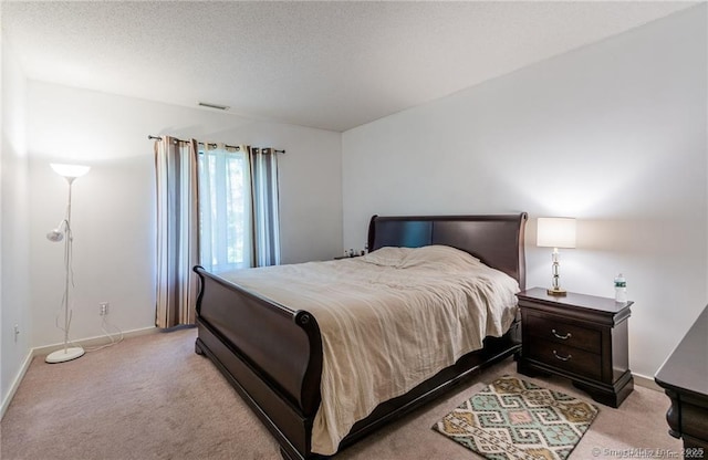 500 Prospect St Apt 1F, New Haven, CT 06511 - carpeted bedroom with baseboards and a textured ceiling