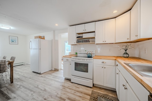 10 Sperry St, Milford, CT 06460 - kitchen with white appliances, butcher block counters, light wood finished floors, tasteful backsplash, and white cabinetry