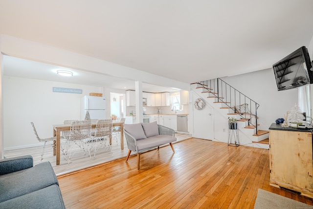 10 Sperry St, Milford, CT 06460 - living room with stairs and light wood-style floors