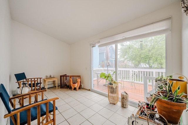10 Sperry St, Milford, CT 06460 - sitting room featuring vaulted ceiling and light tile patterned floors