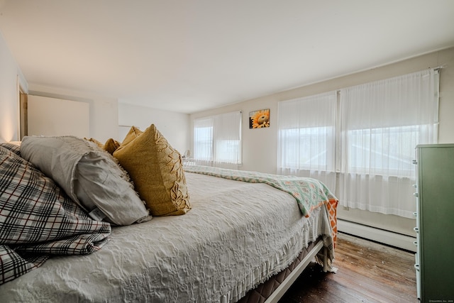 10 Sperry St, Milford, CT 06460 - bedroom with baseboard heating and hardwood / wood-style floors