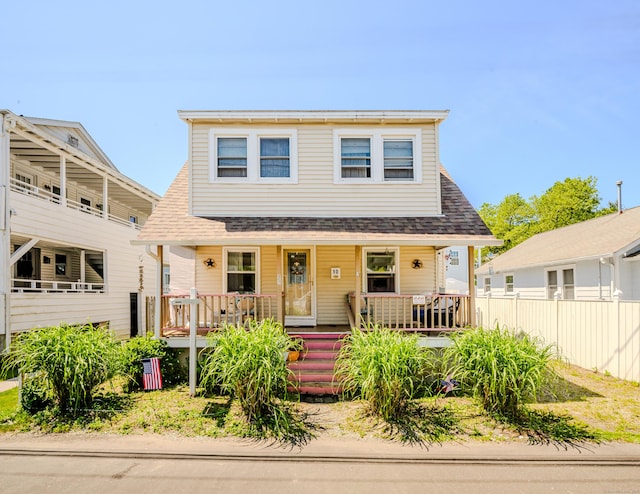 10 Sperry St, Milford, CT 06460 - view of front of house featuring covered porch and a shingled roof