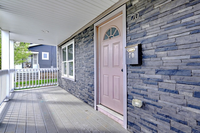 entrance to property with covered porch
