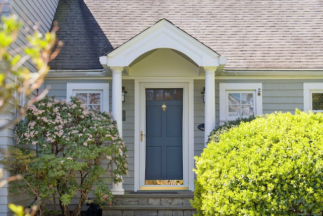 43 Pine Point Rd, Norwalk, CT 06853 - property entrance with roof with shingles
