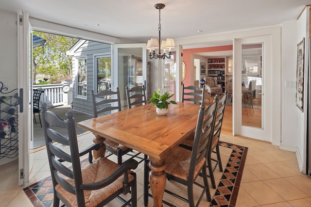 43 Pine Point Rd, Norwalk, CT 06853 - dining room with a chandelier and light tile patterned floors