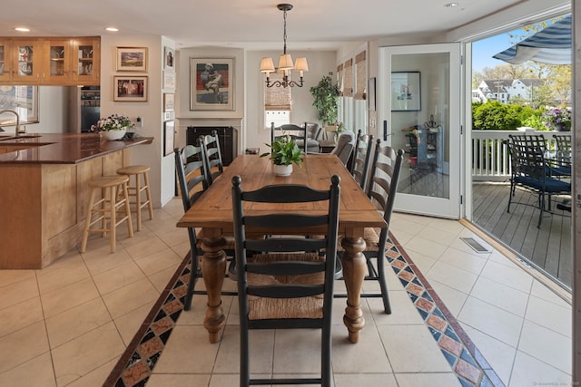 43 Pine Point Rd, Norwalk, CT 06853 - dining room featuring recessed lighting, a chandelier, and light tile patterned flooring