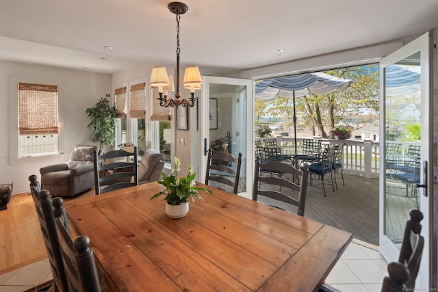 43 Pine Point Rd, Norwalk, CT 06853 - dining room with a chandelier, light tile patterned flooring, and recessed lighting