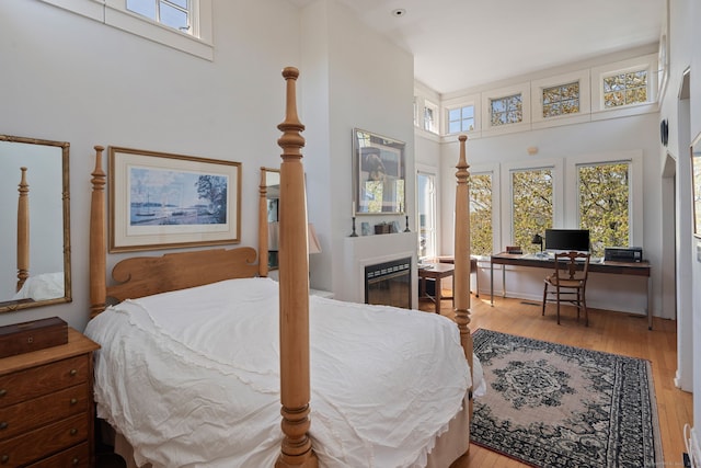 43 Pine Point Rd, Norwalk, CT 06853 - bedroom featuring a towering ceiling and wood finished floors