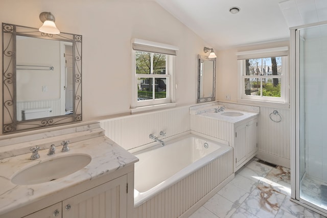 43 Pine Point Rd, Norwalk, CT 06853 - bathroom with a wainscoted wall, marble finish floor, lofted ceiling, and a sink