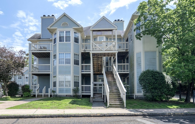 75 Redwood Dr Unit 609, East Haven, CT 06513 - view of building exterior with stairs