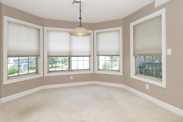 75 Redwood Dr Unit 609, East Haven, CT 06513 - carpeted empty room with plenty of natural light and baseboards