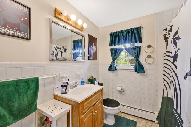 bathroom featuring a shower with curtain, tile walls, a baseboard heating unit, toilet, and vanity