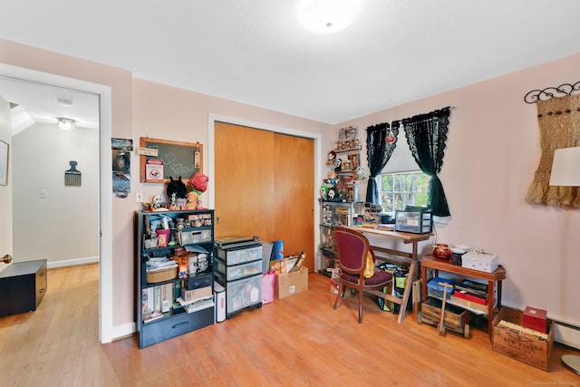 office with wood finished floors and baseboards