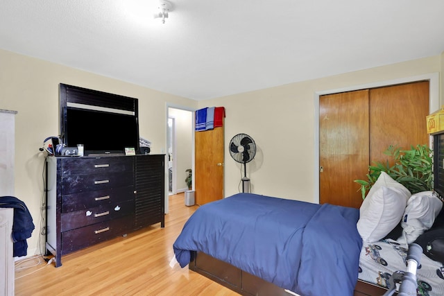 bedroom featuring light wood-style floors