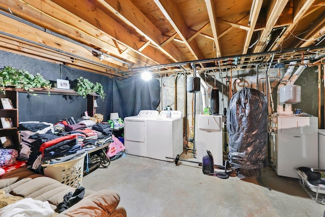 unfinished basement with separate washer and dryer
