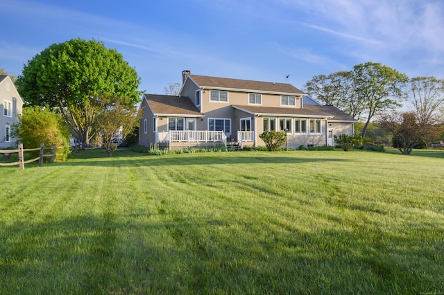 23 Hefflon Farm Rd, Old Lyme, CT 06371 - rear view of property featuring a deck and a chimney