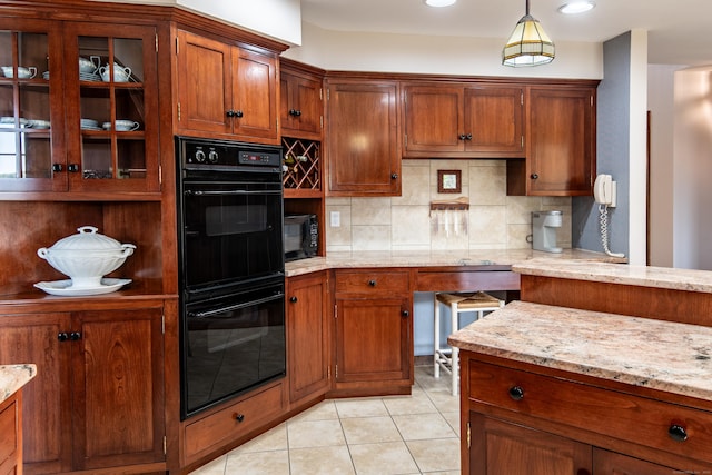 23 Hefflon Farm Rd, Old Lyme, CT 06371 - kitchen with backsplash, brown cabinetry, and hanging light fixtures