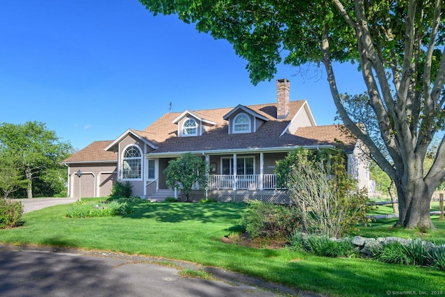 23 Hefflon Farm Rd, Old Lyme, CT 06371 - view of front of home with a chimney, covered porch, a front yard, a garage, and driveway