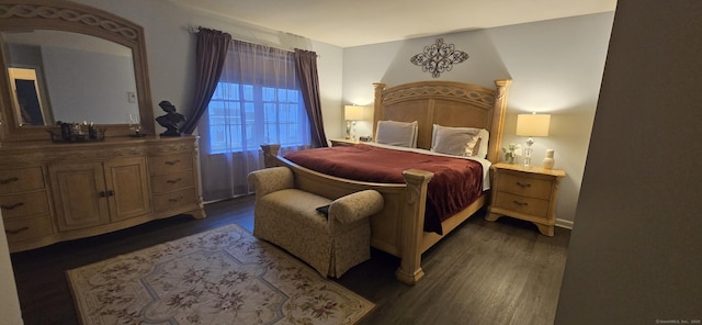 bedroom with wood finished floors