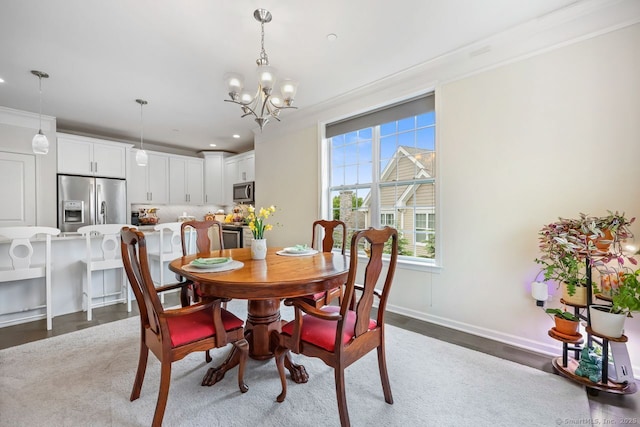 1022 Country View Rd Unit 1022, Danbury, CT 06810 - dining area featuring a chandelier, recessed lighting, wood finished floors, and crown molding