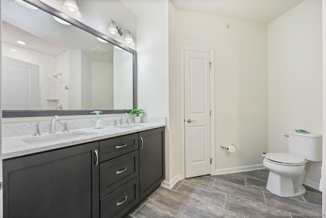 1022 Country View Rd Unit 1022, Danbury, CT 06810 - bathroom with double vanity, a shower, and wood finish floors
