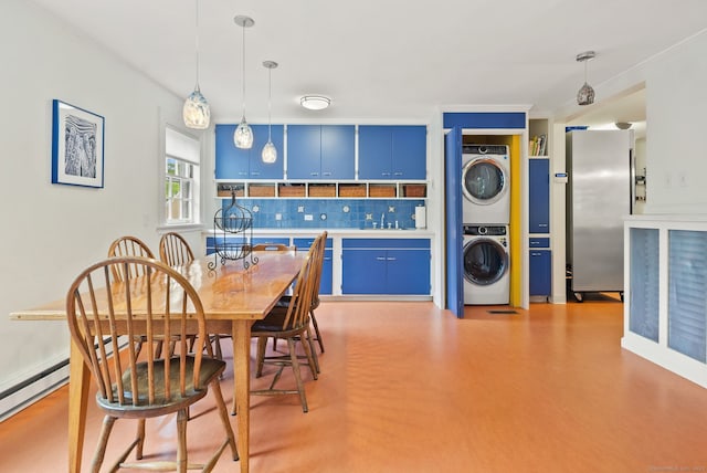 44 Walbridge Rd, West Hartford, CT 06119 - dining room with stacked washer and clothes dryer and ornamental molding