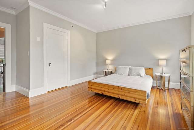 44 Walbridge Rd, West Hartford, CT 06119 - bedroom featuring light wood finished floors, baseboards, and crown molding