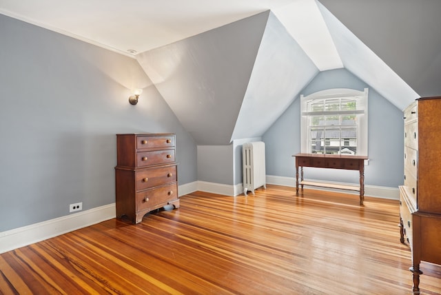 44 Walbridge Rd, West Hartford, CT 06119 - bonus room featuring radiator, light wood finished floors, lofted ceiling, and baseboards